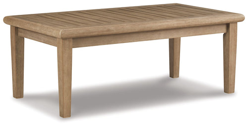 Rectangular wooden cocktail table with slatted surface and tapered legs