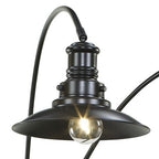 Black metal dome lamp shade with exposed bulb and curved arm detail