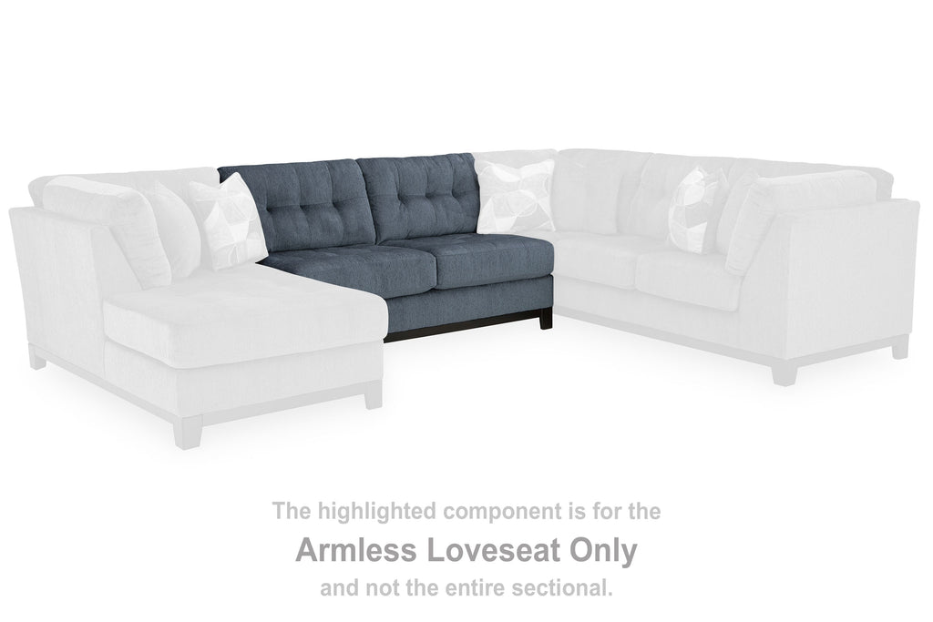 Dark navy armless loveseat section with tufted back and matching seat cushions