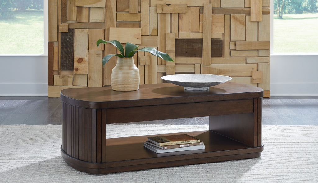 Dark brown lift-top cocktail table with open shelf, styled with tabletop items