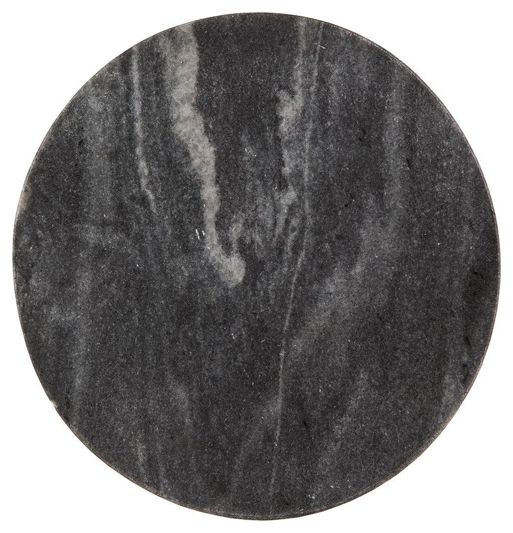Round dark marble tabletop with mottled gray veining