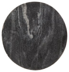 Round dark marble tabletop with mottled gray veining