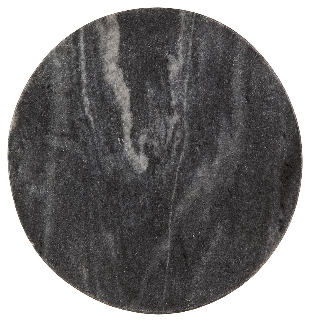 Round dark marble tabletop with mottled gray veining