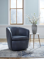 Blue upholstered swivel chair with rounded arms and low curved back