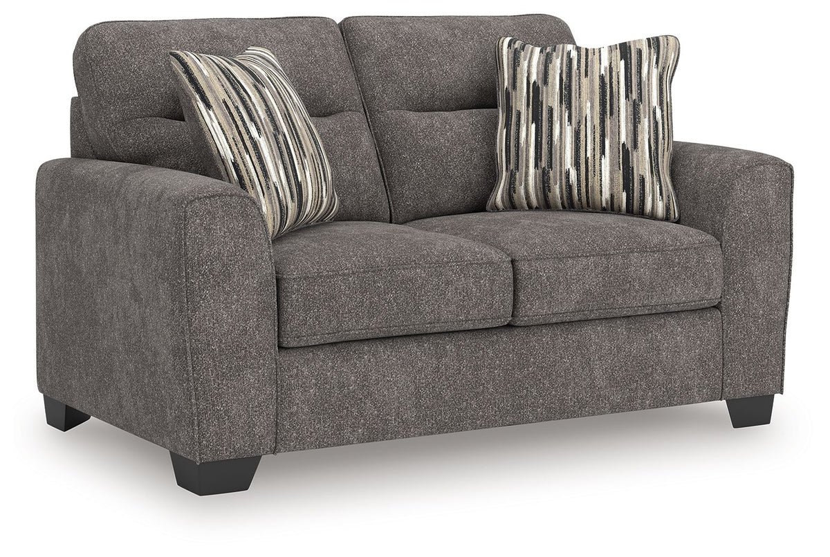 Dark gray upholstered loveseat with two seat cushions and square arms