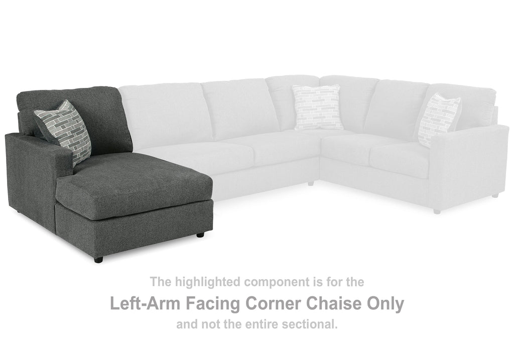 Left-arm corner chaise, dark gray upholstery with two throw pillows