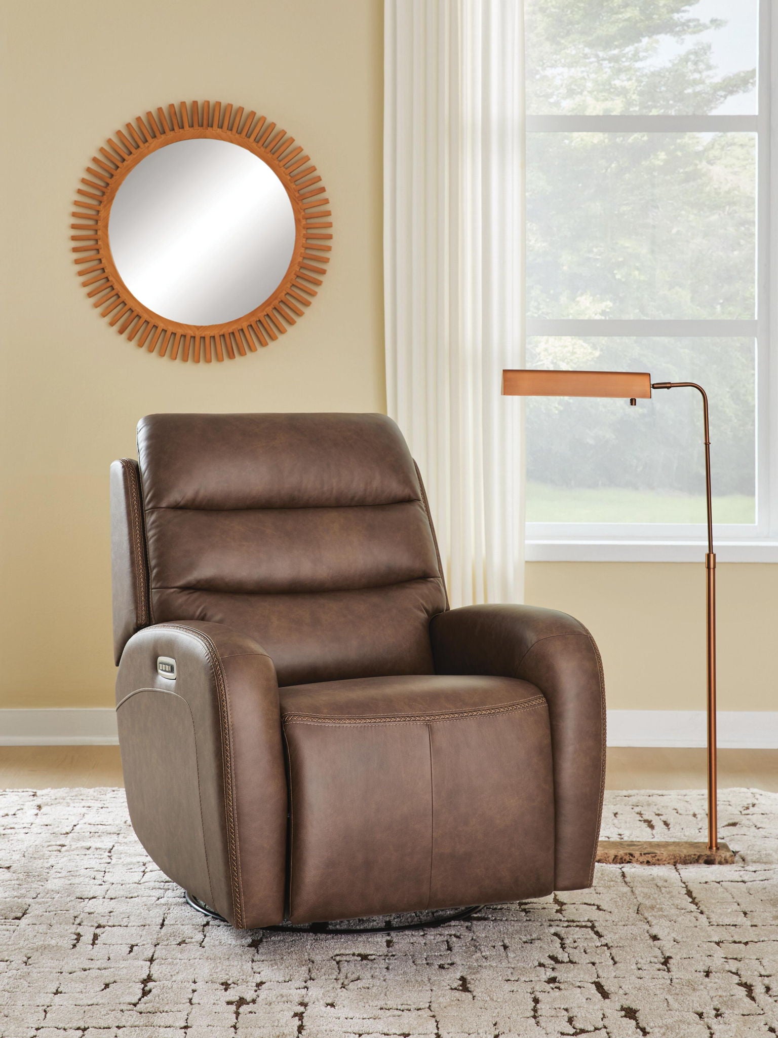Saddle brown power swivel recliner with padded seat, backrest, and head cushion
