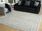 Turinwith rug on living room floor, beige grid design with dark lines