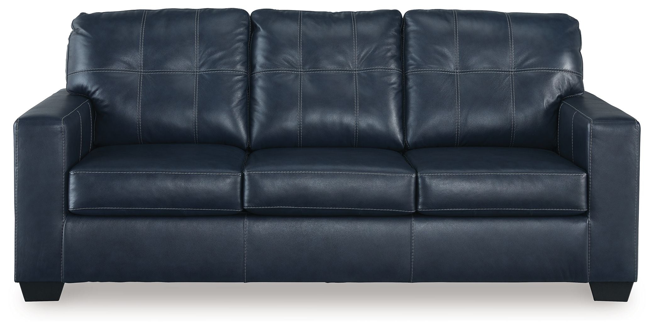 Navy blue sofa sleeper with padded arms and tufted back cushions