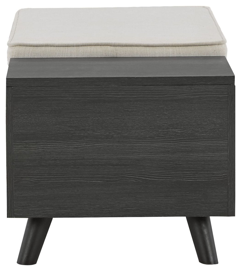 Dark gray storage bench with beige cushion on square frame and tapered legs