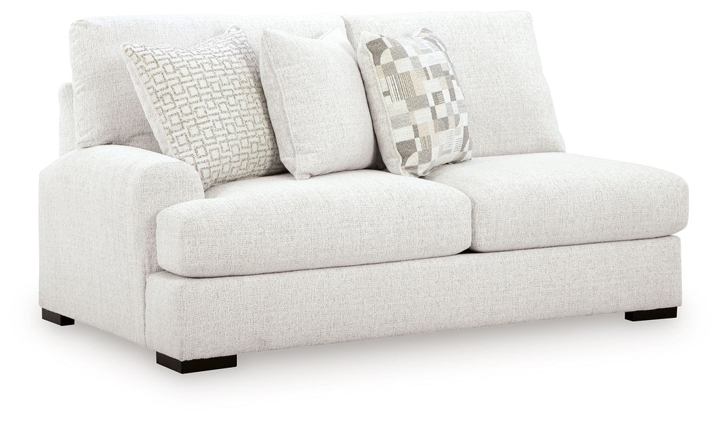 Chalk fabric left-arm loveseat with two square arms and patterned throw pillows