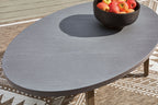 Oval gray cocktail table with fabric-finish top and tapered wood legs