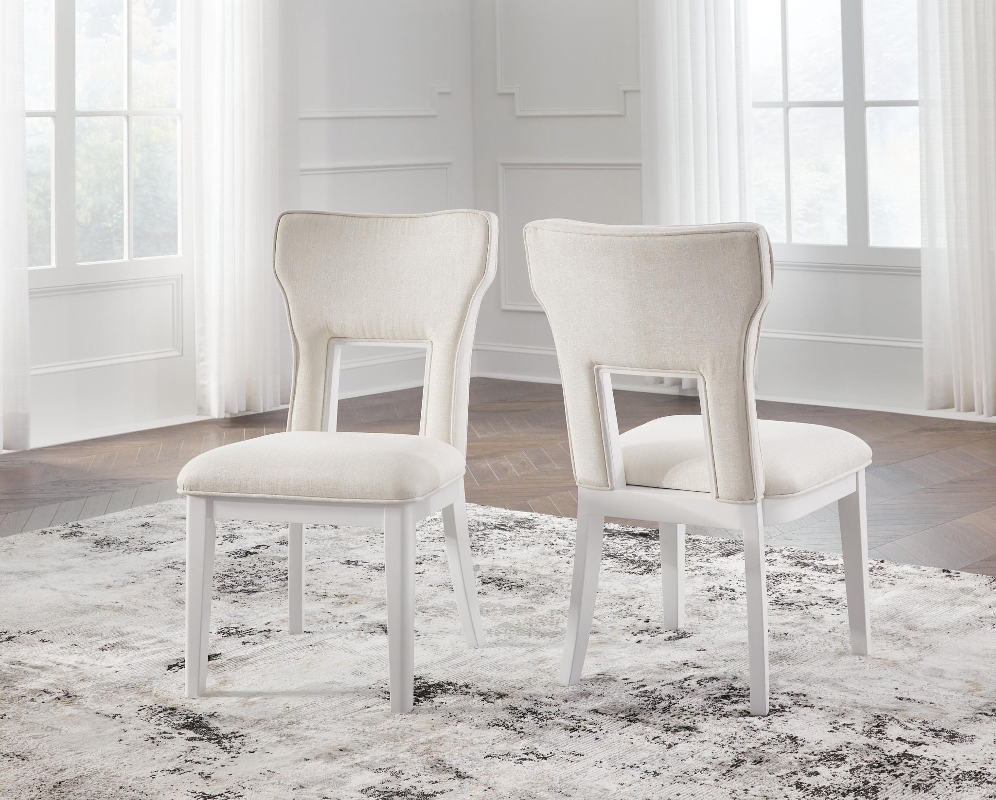 White upholstered dining side chairs with arched back, padded seat, white legs (set of 2)