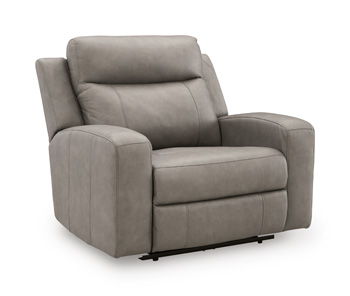 Wide power recliner chair in light gray fabric with padded arms and headrest