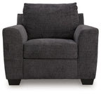 Loreo chair in dark gray textured fabric with thick backrest and arm padding