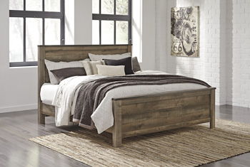 Brown king bed frame with panel rails and flat slat-style base