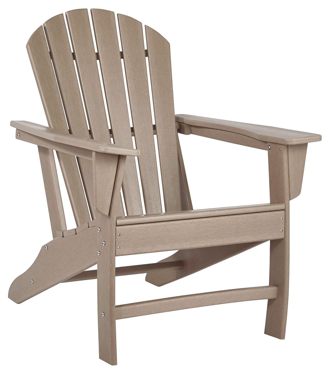 Outdoor Adirondack chair in light brown wood slats, wide arms and curved back.