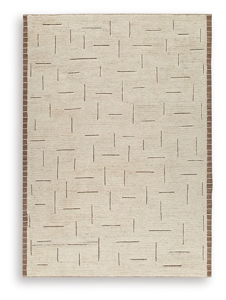 Beige rug with abstract raised line pattern and short, flat woven texture