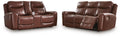 Dark brown power reclining sofa and loveseat with cushioned armrests