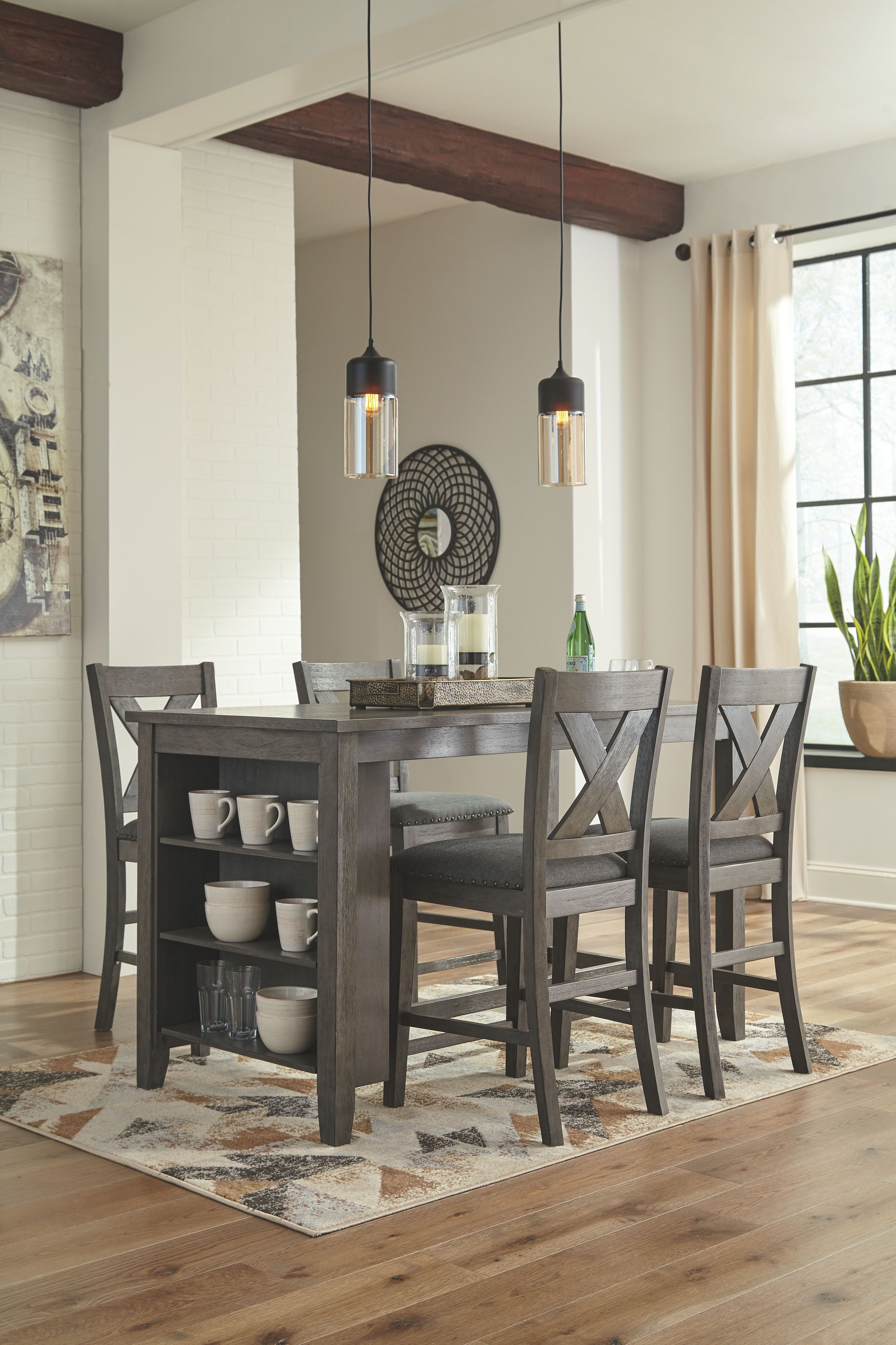 Gray rectangular counter table with three gray upholstered stools and two barstools