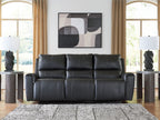 Black reclining sofa with tufted cushions and padded armrests