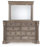 Grayish brown dresser with rectangular mirror, stacked drawers and antique-style hardware