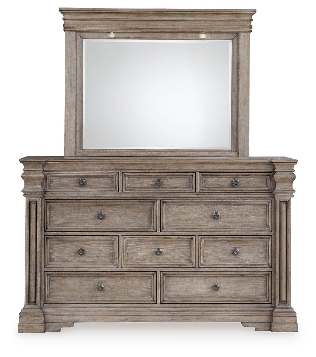 Grayish brown dresser with rectangular mirror, stacked drawers and antique-style hardware
