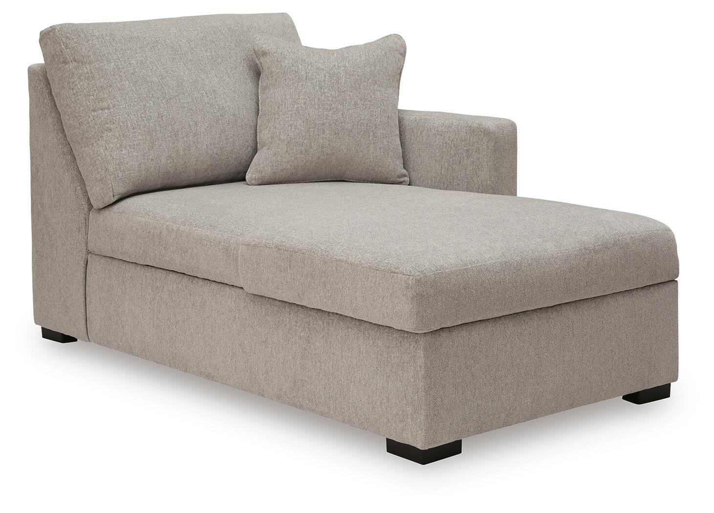 Light gray corner chaise with padded seat and two back cushions, squared arms