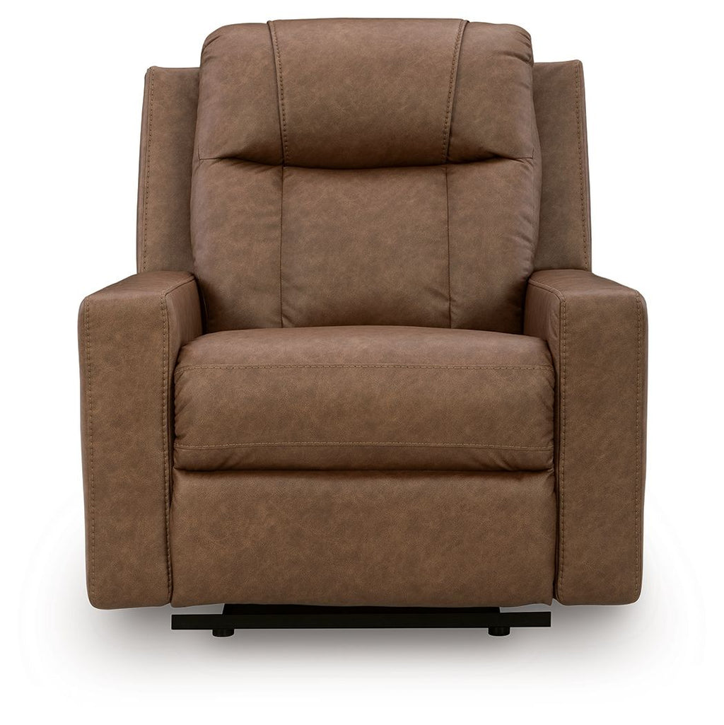 Caramel zero-wall recliner with tufted back, padded arms, and wide cushioned seat