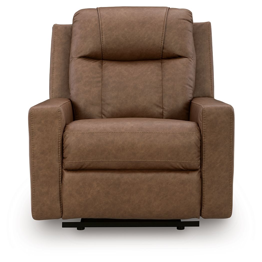 Caramel zero-wall recliner with tufted back, padded arms, and wide cushioned seat