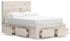 Beige panel bed with under-bed storage drawers and white mattress