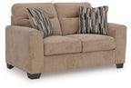 Light brown upholstered loveseat with two seat cushions and two striped pillows