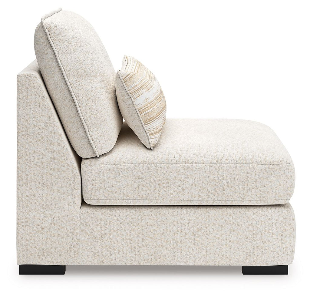 Armless chair corner with light beige fabric, tall back, and striped throw pillow