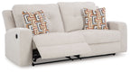 Stone 2-seat reclining sofa with open recline seats and geometric pattern throw pillows