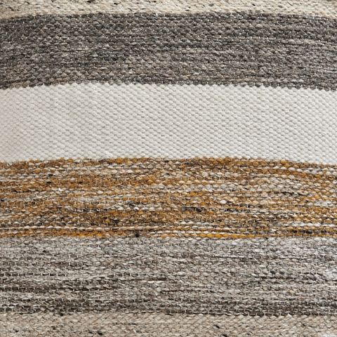 Striped fabric pouf in gray, white, and tan with textured woven surface.
