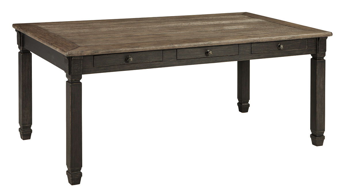 Dark gray dining table with plank top and drawer details on apron