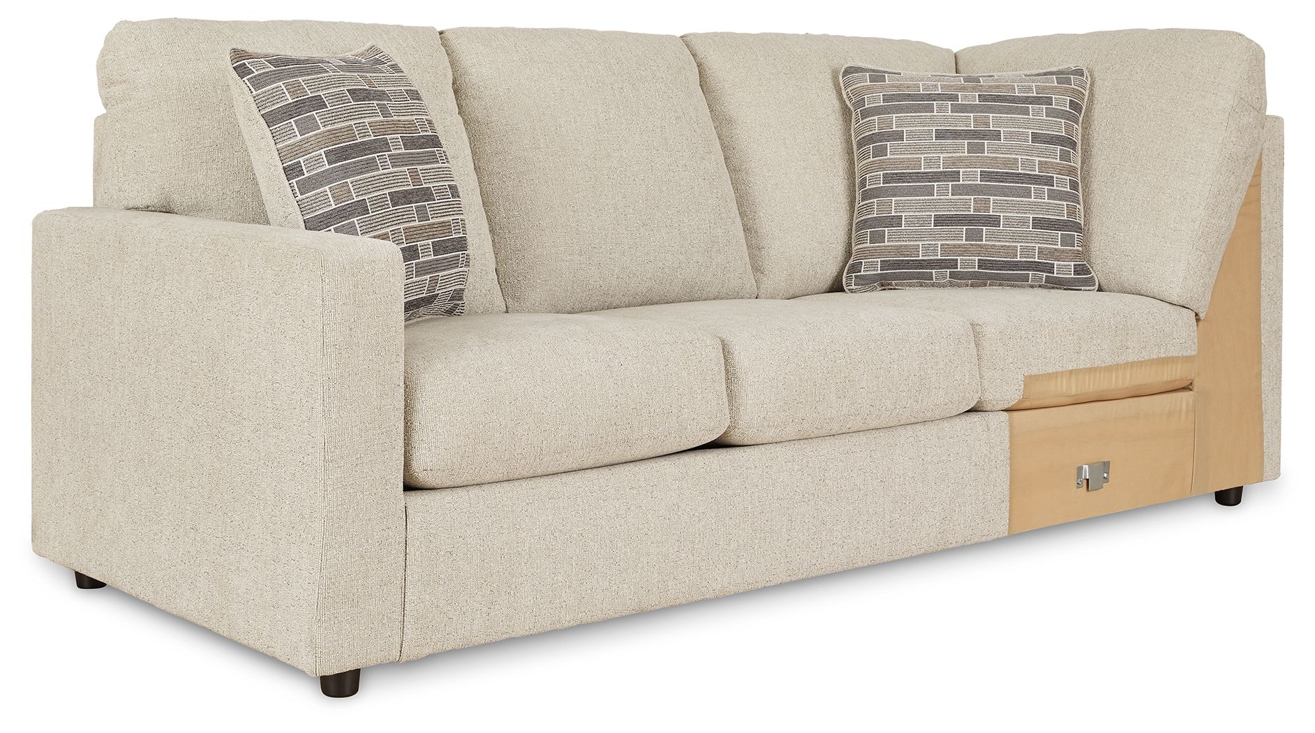 Pearl silver wedge sofa with three seat cushions, two patterned pillows, and wood side panel