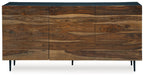 Brown wood accent cabinet with three front compartments and dark legs