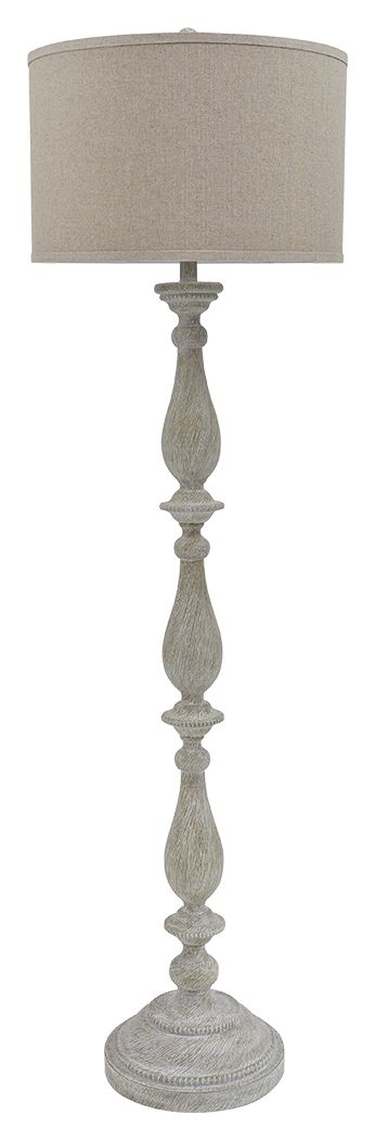 Whitewash poly floor lamp with beige fabric drum shade and carved pedestal base