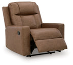 Caramel zero-wall recliner with recline footrest, padded arms, and oval arm detail