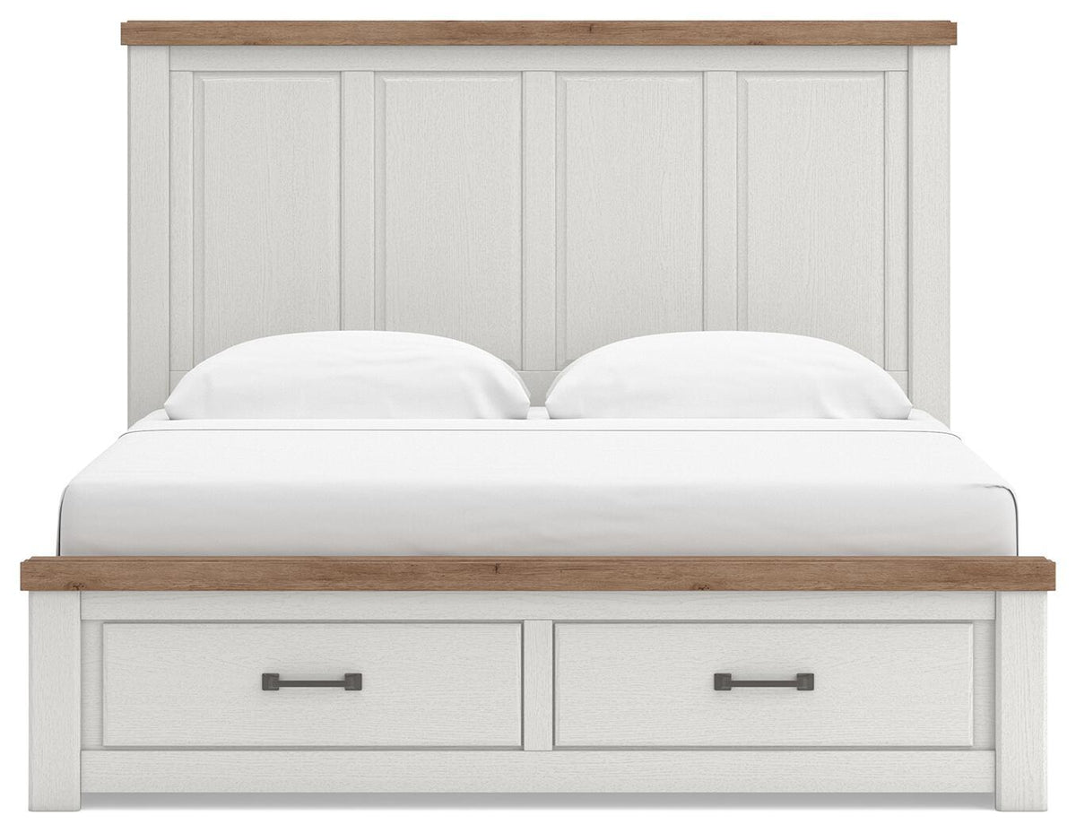 White panel storage bed with wood-trim headboard and two center pull-out drawers, front view