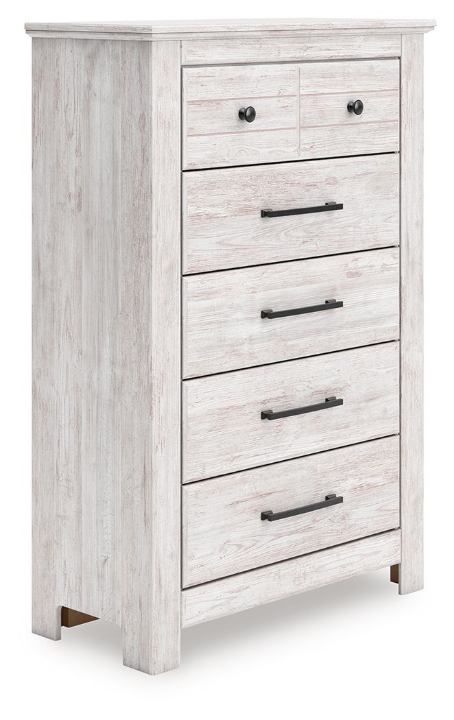 Whitewashed five-drawer chest with black bar handles and dark drawer pulls