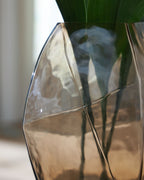 Ewart glass vase close-up, faceted amber-to-clear glass with angled lines