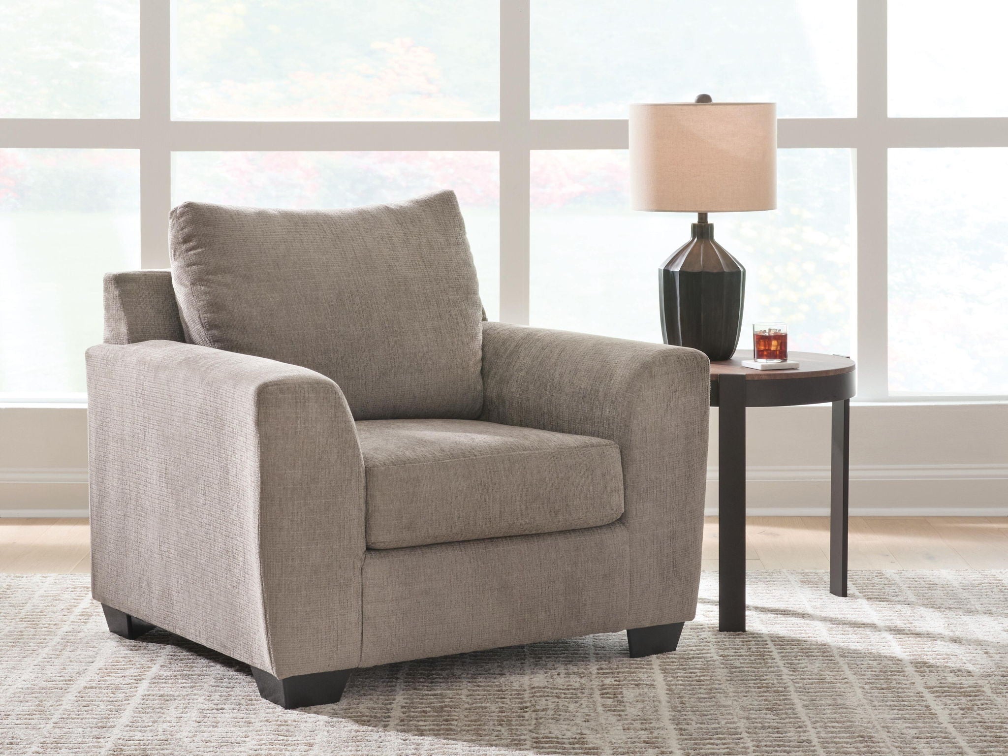 Loreo chair in light beige fabric with cushioned seat and tall backrest