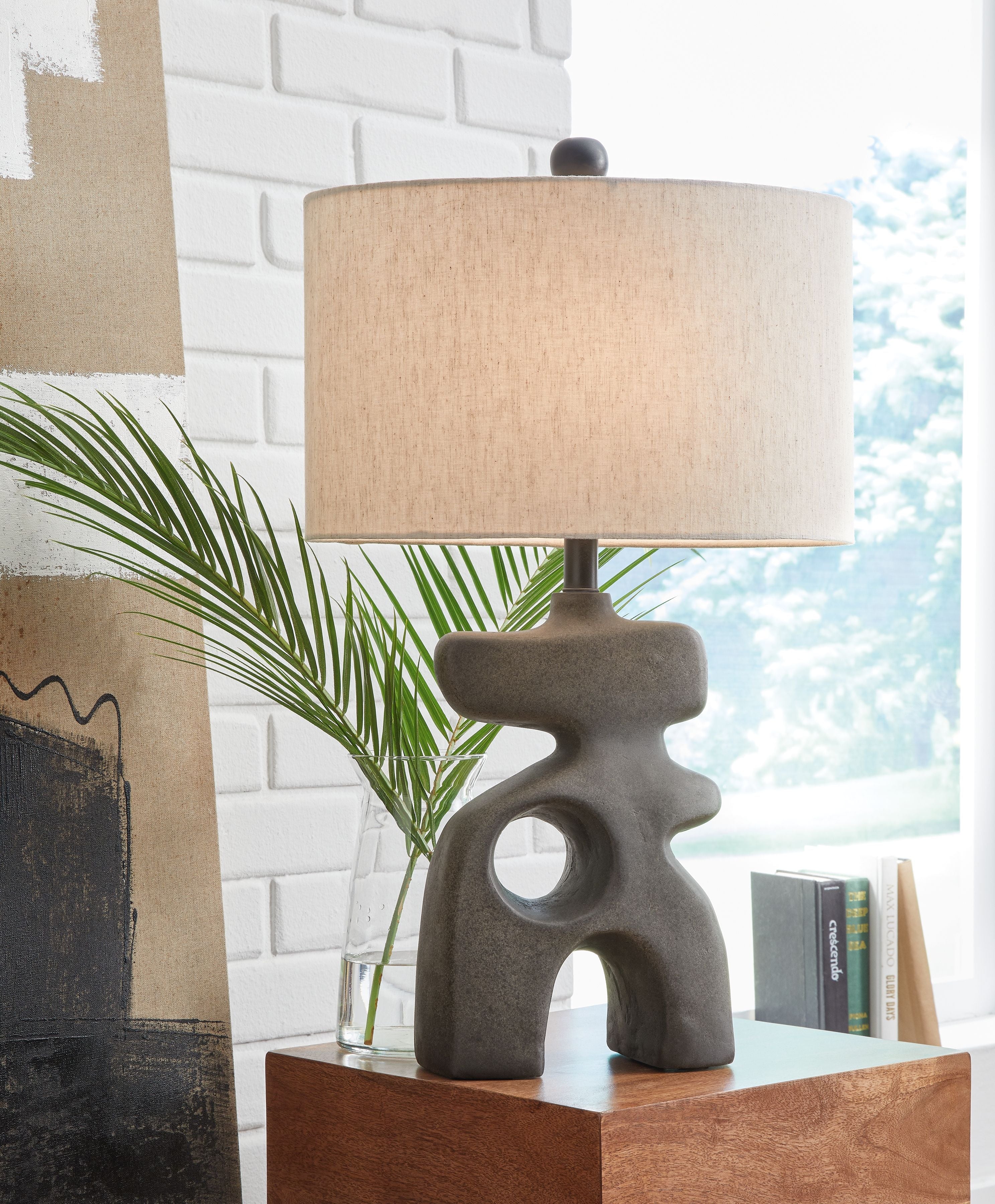 Danacy paper table lamp with textured beige shade and distressed dark gray abstract base