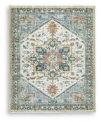 Wallney rug with light cream field and blue medallion center, ornate border