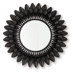 Round accent mirror with dark metal petal frame and clear glass