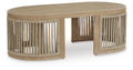 Beige cocktail table with circular top and slatted pedestal base