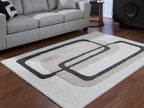 Beige rug with black geometric rectangles pattern