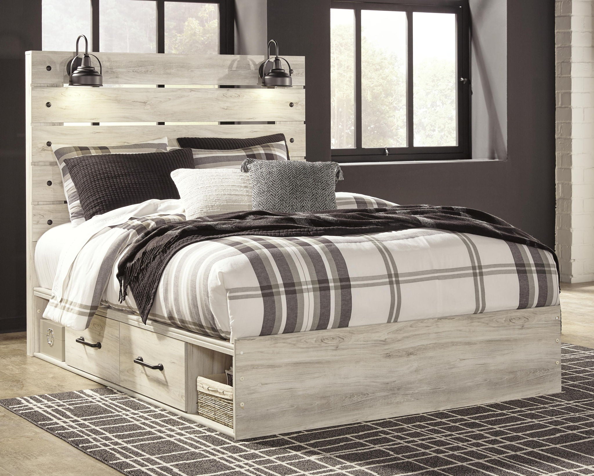 Beige panel bed with side drawers and plaid bedding with pillows